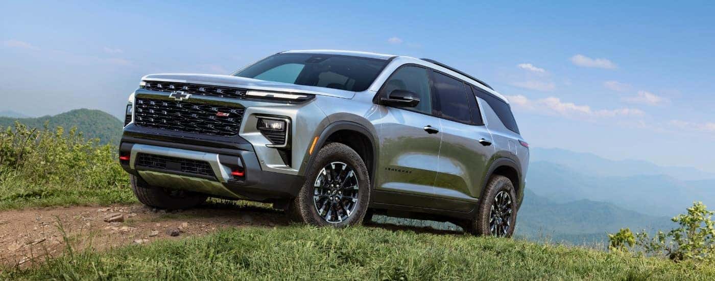 Silver 2024 Chevy Traverse Z71 on a trail