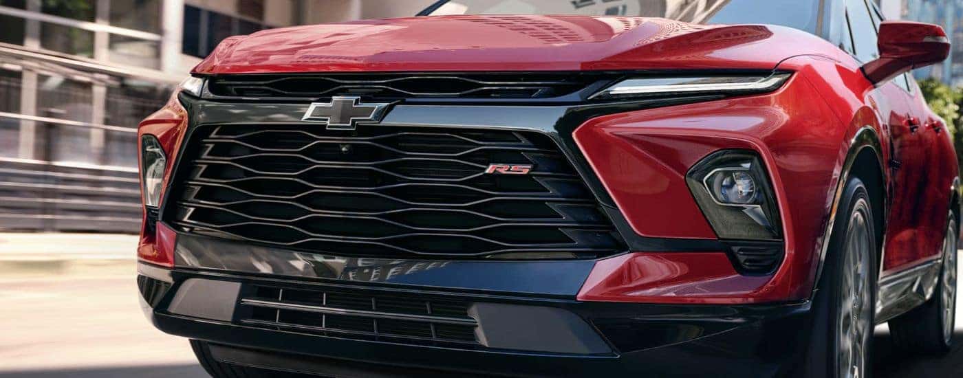 Front grille of a red 2026 Chevy Blazer.