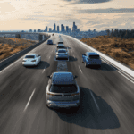 Group of Nissan Pathfinder vehicles on a highway.