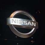 Nissan logo on storefront.