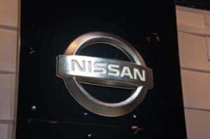 Nissan logo on storefront.