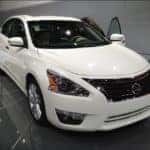 Nissan Altima in white color.