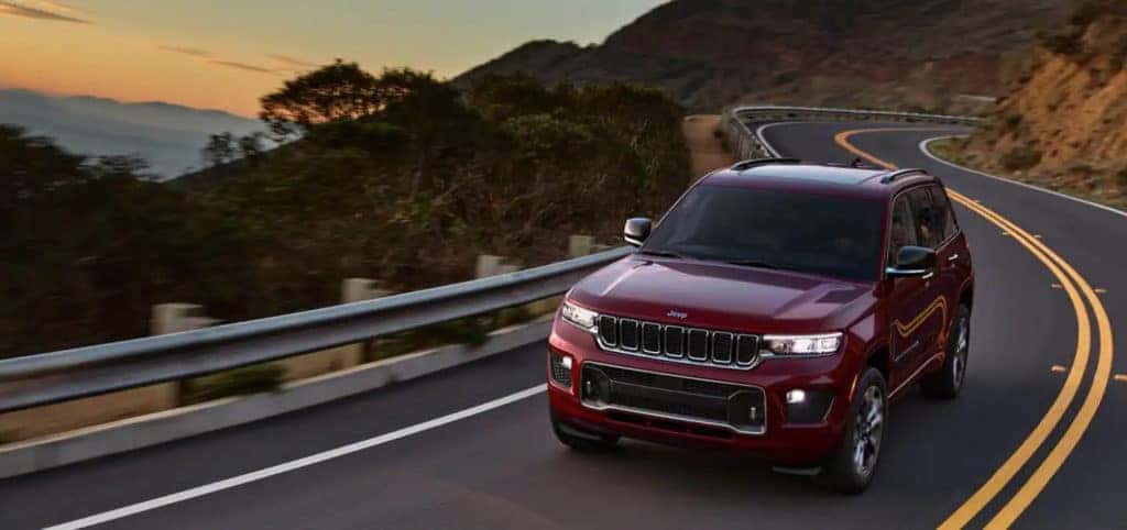 2022 jeep grand cherokee driving on a mountain pass