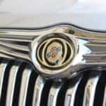 The Chrysler logo on the hood of a Chrysler car.