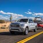 ram truck towing boat