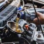 pouring engine oil
