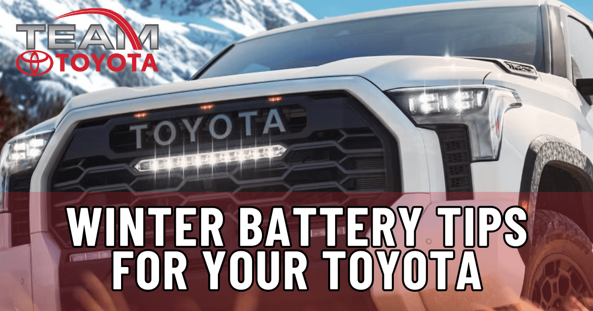 Close-up of a Toyota Tundra with a snowy mountain in the background, highlighting its rugged design and readiness for winter driving in Ohio