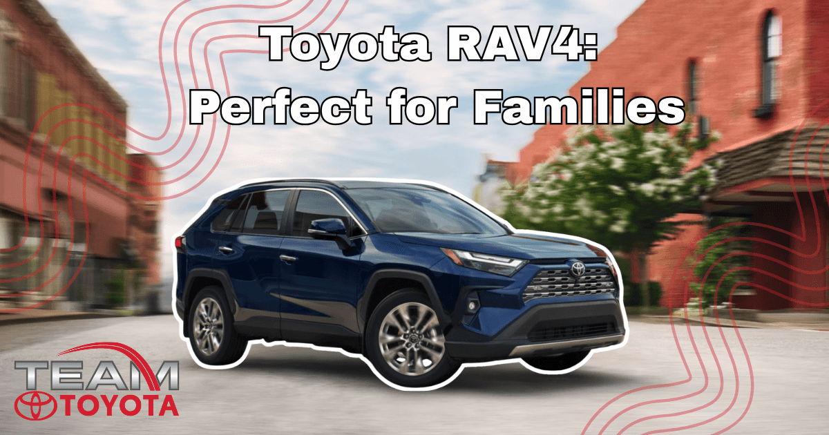 2025 Toyota RAV4 driving down a city street, showcasing its family-friendly design and versatility