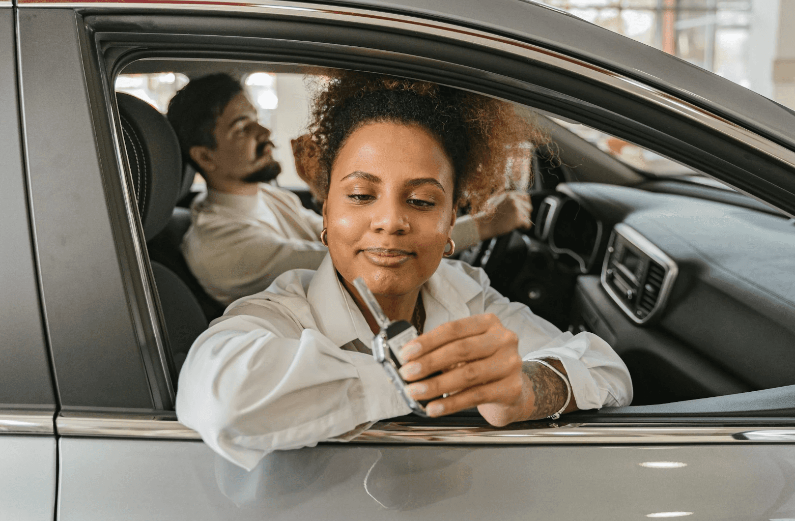 Person getting the car keys after starting a lease