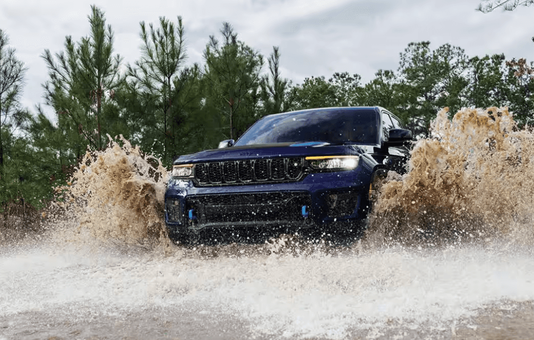 The 2024 Jeep Grand Cherokee fording a large puddle