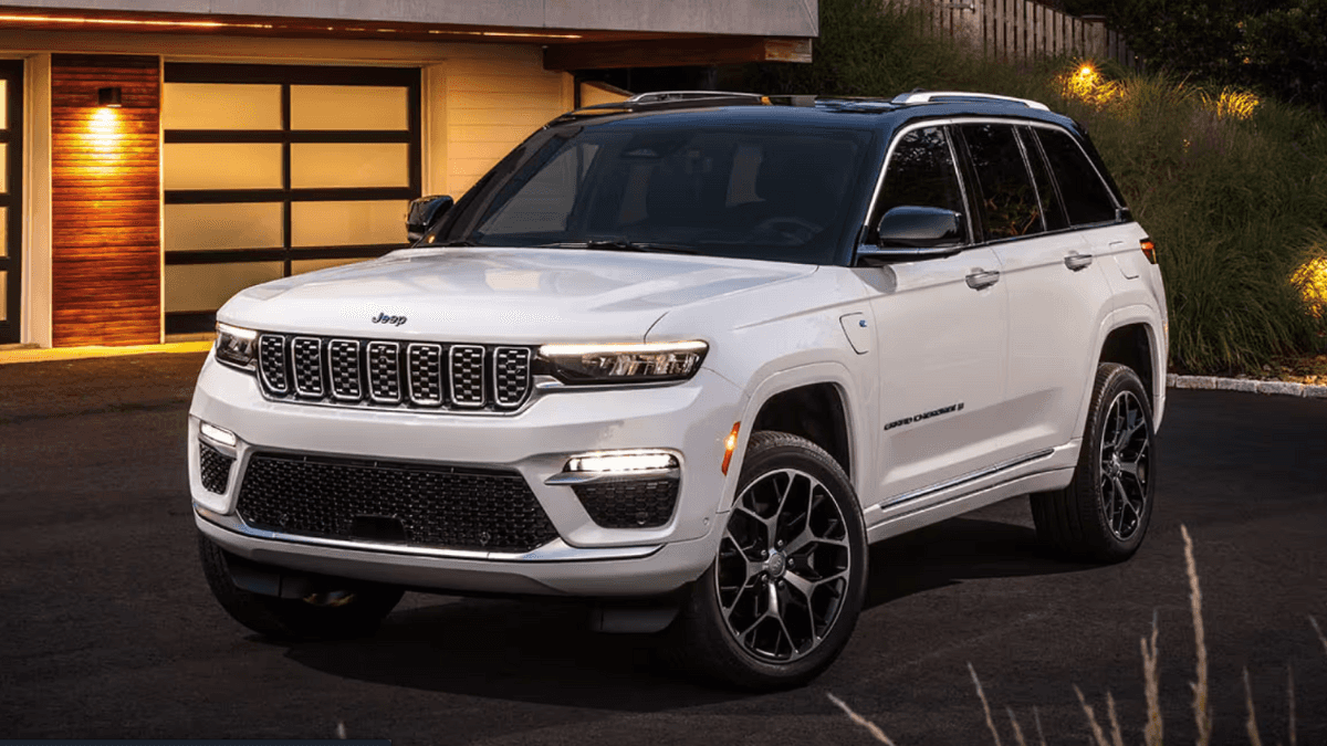 2024 Jeep Grand Cherokee parked in front of a house