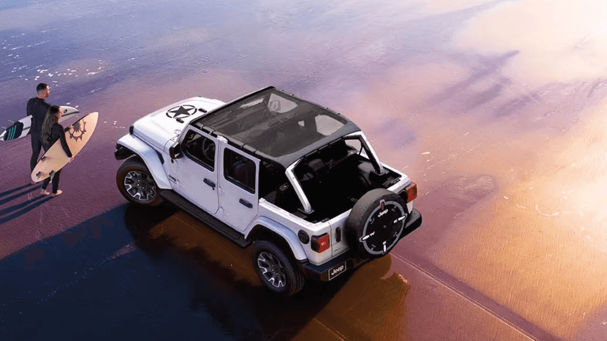 Jeep Wrangler parked on the beach in summer in Western New York