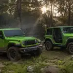 Jeep Gladiator and Jeep Wrangler in the woods