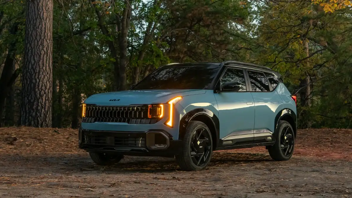 Kia Seltos SUV parked in the woods