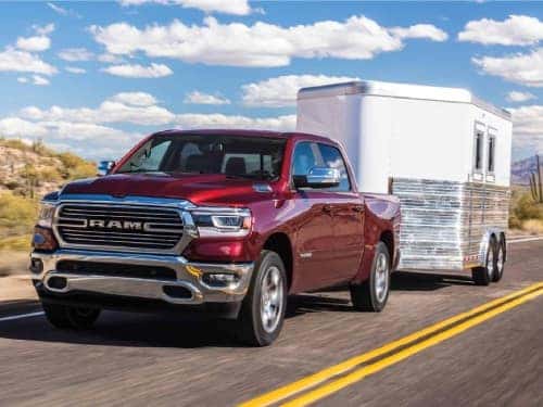 2024 RAM 1500 towing an enclosed trailer