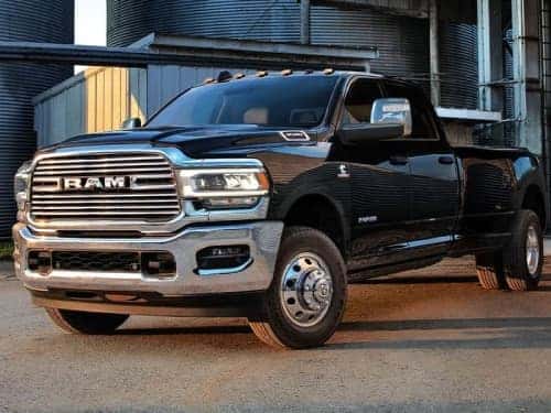 2024 RAM 3500 exterior view parked outside an industrial work area