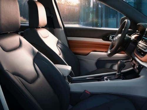 2024 Jeep Compass side interior view of front seats and steering wheel