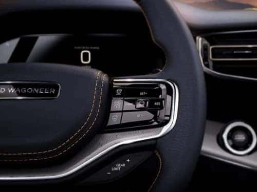 2024 Grand Wagoneer close up view of steering wheel and dash area
