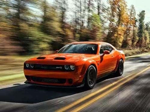 2023 Dodge Challenger driving on a road