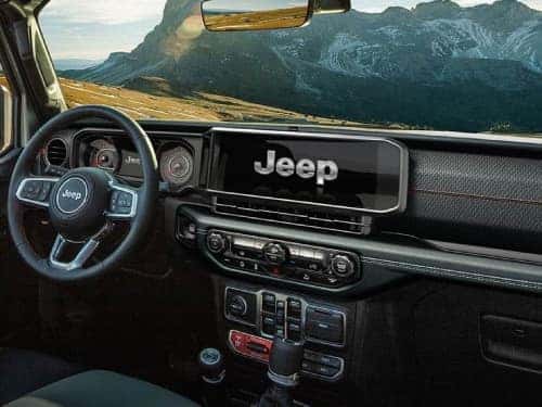2024 Jeep Wrangler dash area showing touchscreen display