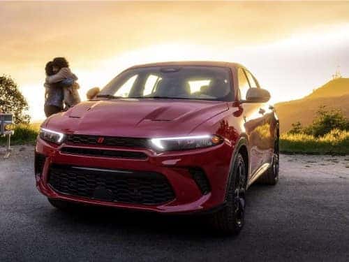 2024 Dodge Hornet parked on a blacktop at sunset